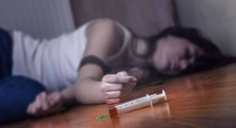 lighthousetreatment what is heroin cut with article photo close up on the floor of the syringe with the drug in the background a young drug addictjpg